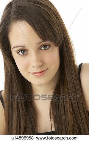 Stock Photo - Studio Portrait Of Teenage Girl On White Background. Fotosearch