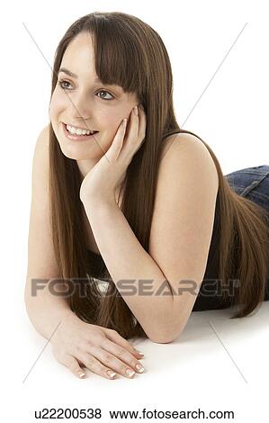 Stock Photo - Studio Portrait Of Teenage Girl On White Background. Fotosearch
