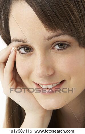 Studio Portrait Of Teenage Girl On White Background View Large Photo Image Stock Photography - Studio Portrait Of Teenage Girl On White Background. Fotosearch