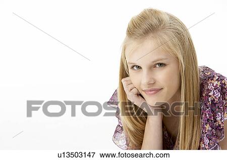 Stock Photo - Studio Portrait Of Teenage Girl. Fotosearch