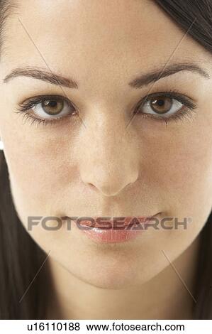 Studio Portrait Of Thoughtful Woman View Large Photo Image Stock Photo - Studio Portrait Of Thoughtful Woman. Fotosearch