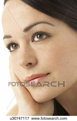Studio Portrait Of Thoughtful Woman View Large Photo Image Stock Photo - Studio Portrait Of Thoughtful Woman. Fotosearch
