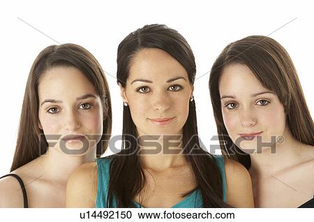 Stock Image - Studio Portrait Of Three Young Women. Fotosearch
