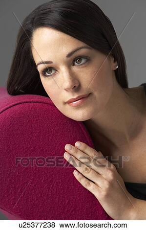 Studio Portrait Of Woman Relaxing On Pink Chaise Longue View Large Photo Image Stock Photo - Studio Portrait Of Woman Relaxing On Pink Chaise Longue. Fotosearch