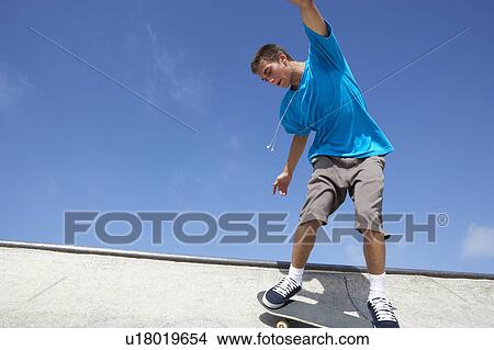 Teenage Boy In Skateboard Park View Large Photo Image Picture - Teenage Boy In Skateboard Park. Fotosearch