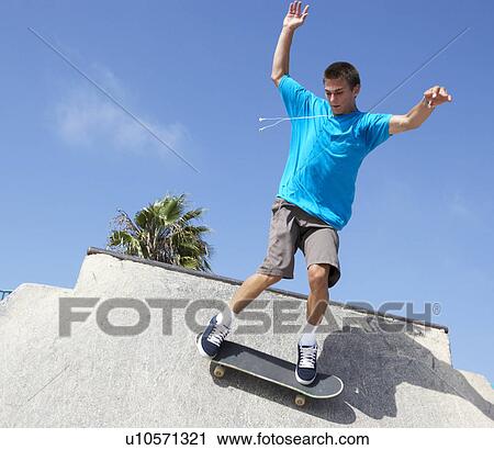 Teenage Boy In Skateboard Park View Large Photo Image Stock Image - Teenage Boy In Skateboard Park. Fotosearch
