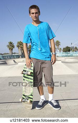 Teenage Boy In Skateboard Park View Large Photo Image Stock Image - Teenage Boy In Skateboard Park. Fotosearch