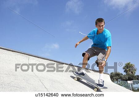 Teenage Boy In Skateboard Park View Large Photo Image Stock Image - Teenage Boy In Skateboard Park. Fotosearch