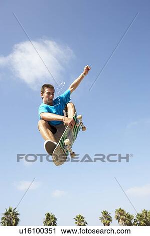 Teenage Boy In Skateboard Park View Large Photo Image Stock Image - Teenage Boy In Skateboard Park. Fotosearch