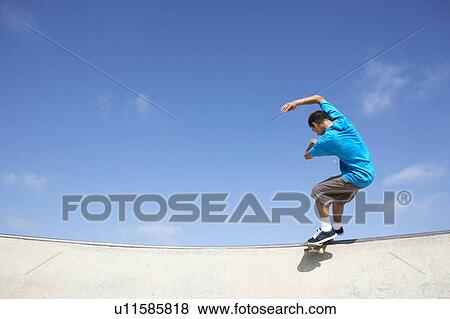 Teenage Boy In Skateboard Park View Large Photo Image Stock Photo - Teenage Boy In Skateboard Park. Fotosearch