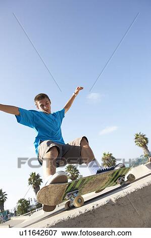 Teenage Boy In Skateboard Park View Large Photo Image Stock Photo - Teenage Boy In Skateboard Park. Fotosearch