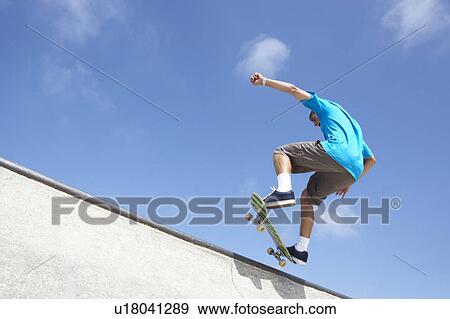 Teenage Boy In Skateboard Park View Large Photo Image Stock Photo - Teenage Boy In Skateboard Park. Fotosearch