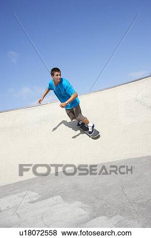 Teenage Boy In Skateboard Park View Large Photo Image Stock Photo - Teenage Boy In Skateboard Park. Fotosearch