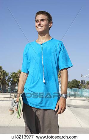Teenage Boy In Skateboard Park View Large Photo Image Stock Photo - Teenage Boy In Skateboard Park. Fotosearch