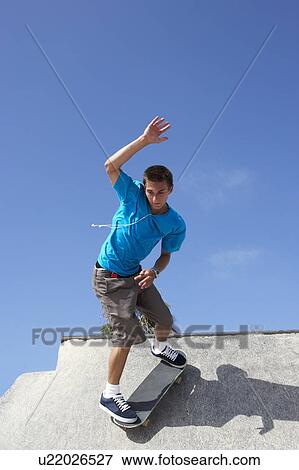 Teenage Boy In Skateboard Park View Large Photo Image Stock Photo - Teenage Boy In Skateboard Park. Fotosearch
