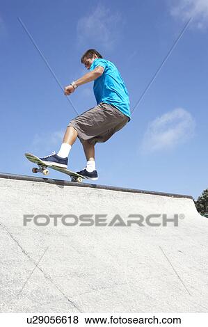 Teenage Boy In Skateboard Park View Large Photo Image Stock Photo - Teenage Boy In Skateboard Park. Fotosearch