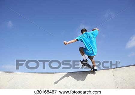 Teenage Boy In Skateboard Park View Large Photo Image Stock Photo - Teenage Boy In Skateboard Park. Fotosearch