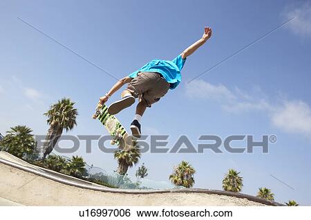 Teenage Boy In Skateboard Park View Large Photo Image Stock Photograph - Teenage Boy In Skateboard Park. Fotosearch