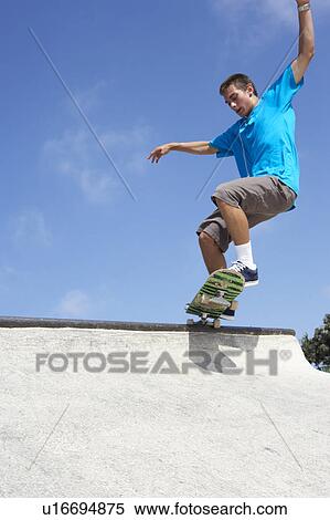 Teenage Boy In Skateboard Park View Large Photo Image Stock Photography - Teenage Boy In Skateboard Park. Fotosearch