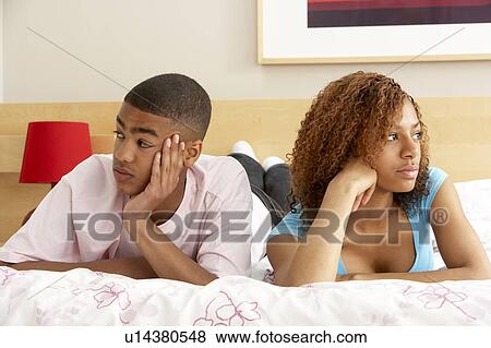 Teenage Couple After Arguement In Bedroom View Large Photo Image Stock Photo - Teenage Couple After Arguement In Bedroom. Fotosearch