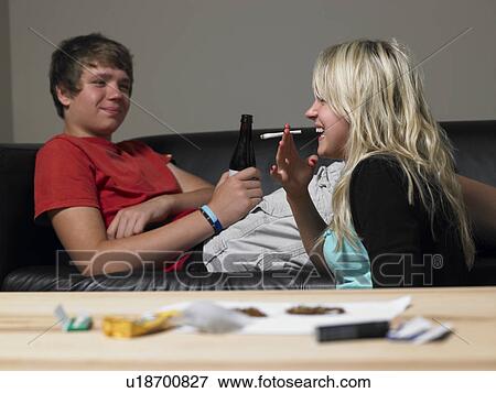 Teenage Couple Taking Drugs At Home View Large Photo Image Stock Photo - Teenage Couple Taking Drugs At Home. Fotosearch