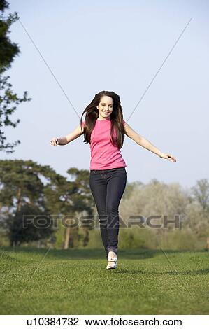 Teenage Girl Running Through Summer Meadow View Large Photo Image Stock Image - Teenage Girl Running Through Summer Meadow. Fotosearch