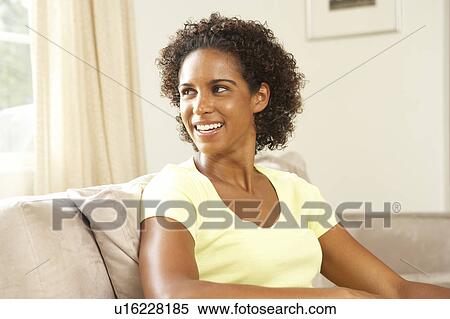Woman Relaxing On Sofa At Home View Large Photo Image Stock Photography - Woman Relaxing On Sofa At Home. Fotosearch
