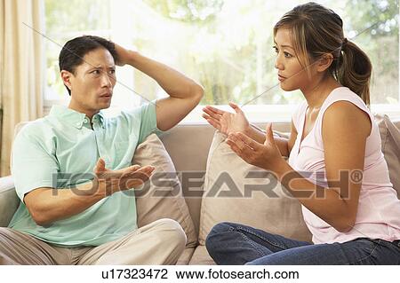 Young Couple Having Argument At Home View Large Photo Image Stock Image - Young Couple Having Argument At Home. Fotosearch