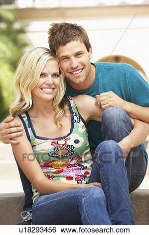 Young Couple Sitting On Steps Of Building View Large Photo Image Stock Photograph - Young Couple Sitting On Steps Of Building. Fotosearch