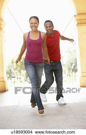 Young Couple Visiting Building In City View Large Photo Image Picture - Young Couple Visiting Building In City. Fotosearch