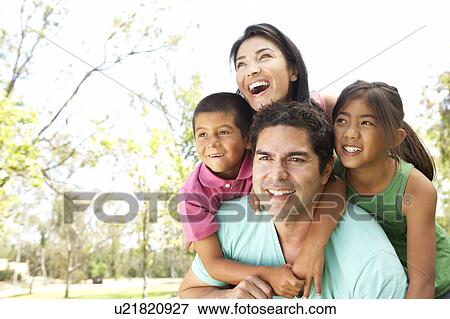 Young Family In Park View Large Photo Image Stock Photo - Young Family In Park. Fotosearch