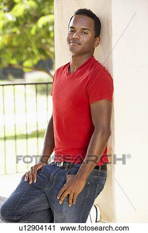 Young Man Leaning Against Pillar View Large Photo Image Stock Image - Young Man Leaning Against Pillar. Fotosearch