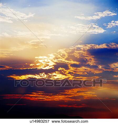 clouds, background, sunset, dusk, golden sky, spectacular, sky View Large Photo Image Stock Photo - clouds, background, sunset, dusk, golden sky, spectacular, sky. Fotosearch