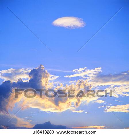 Stock Image - clouds, white clouds, spectacular, blue sky, background, blue sky. Fotosearch