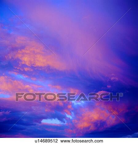 Stock Image - spectacular, sunset, Purple sky, sky, dusk, clouds, background. Fotosearch