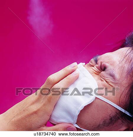 Stock Image - environmental protection, environment, respirator, pollution, contamination, mask. Fotosearch