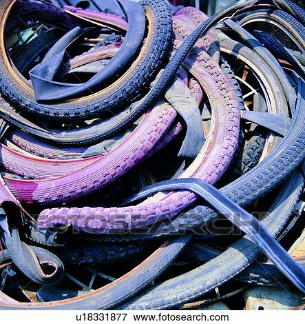 Stock Photo - scrap heap, dump, contamination, waste, refuse, tire. Fotosearch