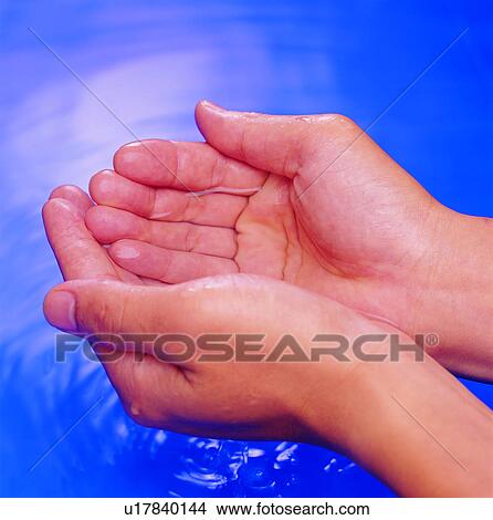 Picture - water, environmental protection, resources, hand, natural resources. Fotosearch