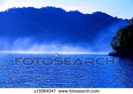 Stock Photo - Diving Vacation, Fog, Morning Fog in Lembeh, Sea, Nature landscape, Ocean, Blue. Fotosearch