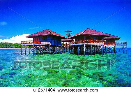 House on the water, Ocean, Sea, Diving Vacation, Blue, Traditional Buildings View Large Photo Image Picture - House on the water, Ocean, Sea, Diving Vacation, Blue, Traditional Buildings. Fotosearch