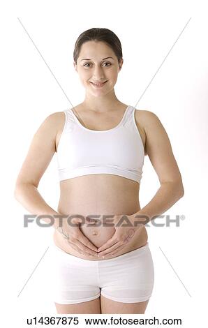 Pregnant young woman touching abdomen, with male and female symbols on her hands View Large Photo Image Stock Photography - Pregnant young woman touching abdomen, with male and female symbols on her hands. Fotosearch
