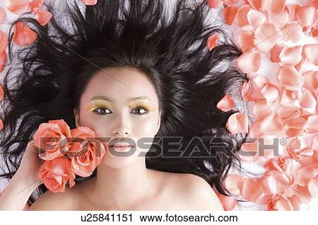Stock Image - A beautiful woman in flower marine. Fotosearch