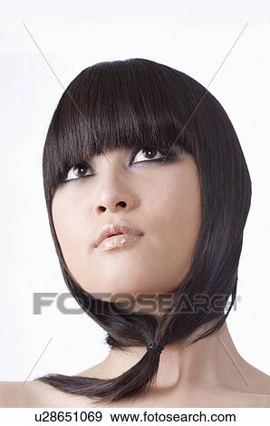Stock Photo - Young women with braided. Fotosearch