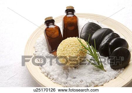 Aromatherapy oil, stones and bath sponge on the plate View Large Photo Image Stock Photograph - Aromatherapy oil, stones and bath sponge on the plate. Fotosearch