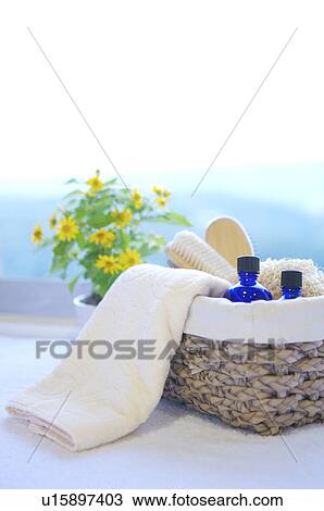 Basket with oils, towels and brush View Large Photo Image Stock Image - Basket with oils, towels and brush. Fotosearch