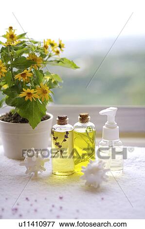 Stock Photo - Pot culture and aromatherapy on the towel. Fotosearch