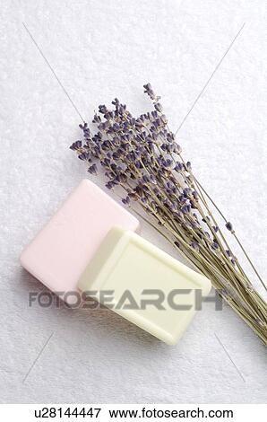 Soaps and lavender on towel View Large Photo Image Stock Photo - Soaps and lavender on towel. Fotosearch
