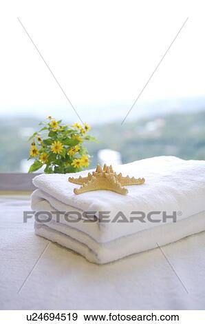Starfish on the folded towel View Large Photo Image Stock Photo - Starfish on the folded towel. Fotosearch
