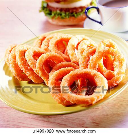 Stock Image - cuisine, cook, food, delicious, onion ring, hamburg, delicacies. Fotosearch
