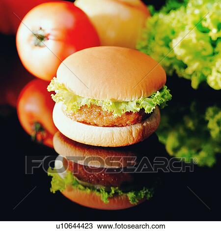 Stock Image - delicious, hamburger, cuisine, cooking, delicacies, cook, meat. Fotosearch